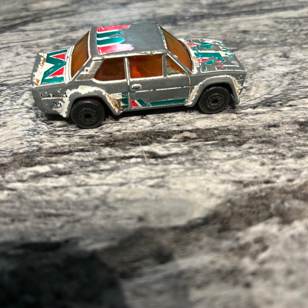 Gray and Green Die-Cast Vehicle Toy